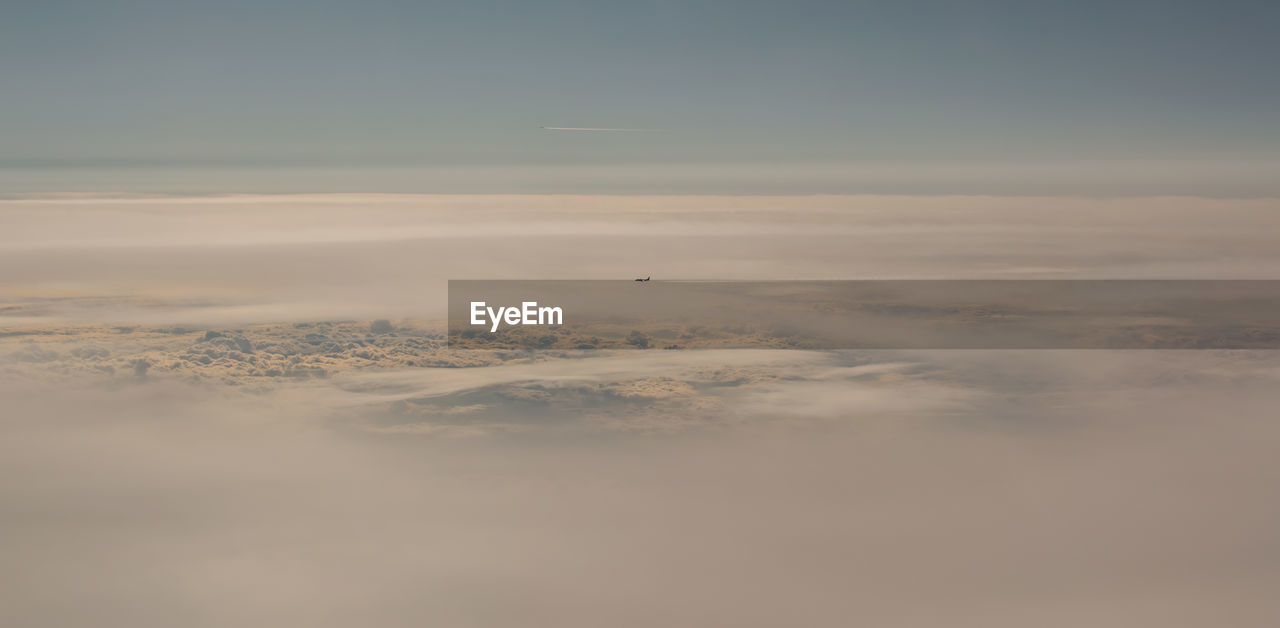 Aerial view of cloud fields above the clouds