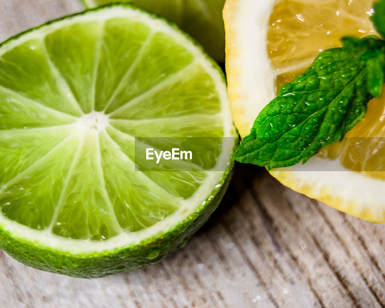 Close-up of green fruits on table