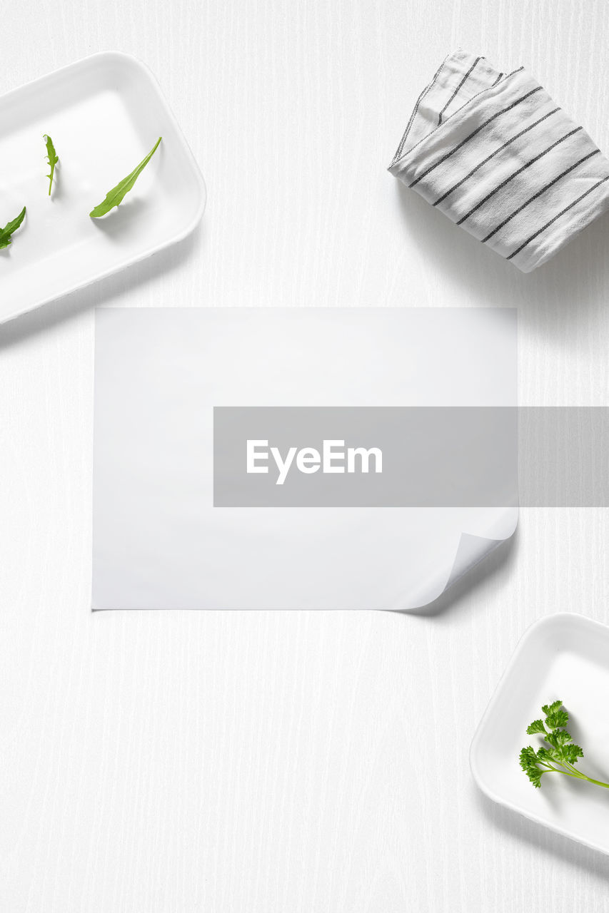 food and drink, food, indoors, copy space, studio shot, no people, herb, wellbeing, kitchen utensil, paper, white background, healthy eating, table, white, plate, eating utensil, rectangle, paper clip, green, fork, simplicity