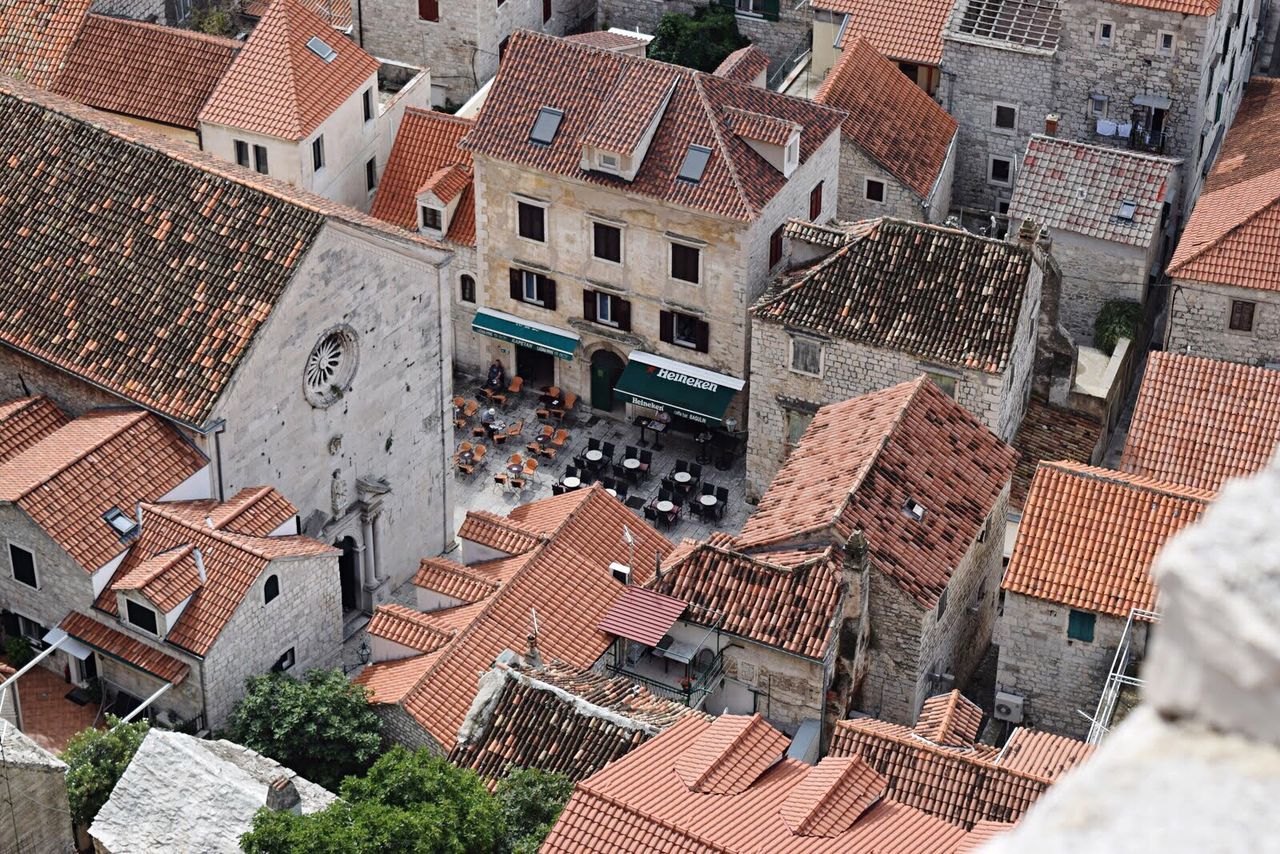 High angle view of old houses with roof tiles