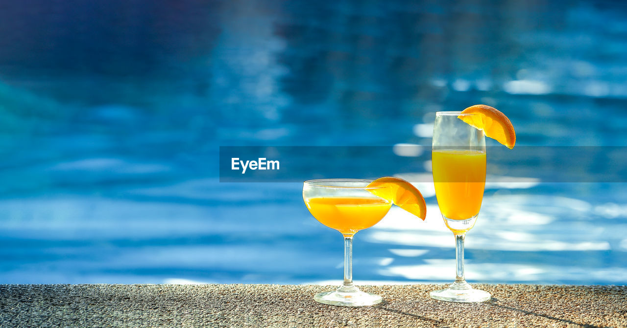 YELLOW DRINK ON BEACH