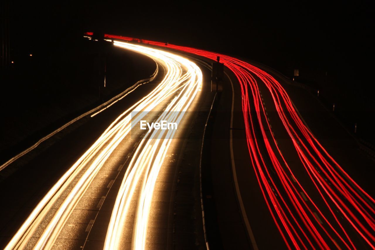 Light trails on road at night