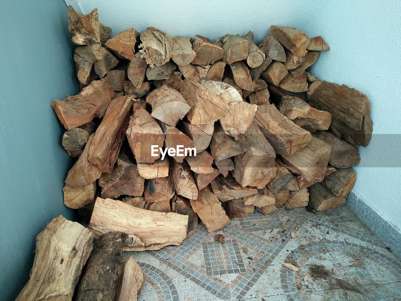 CLOSE-UP OF STACK OF FIREWOOD