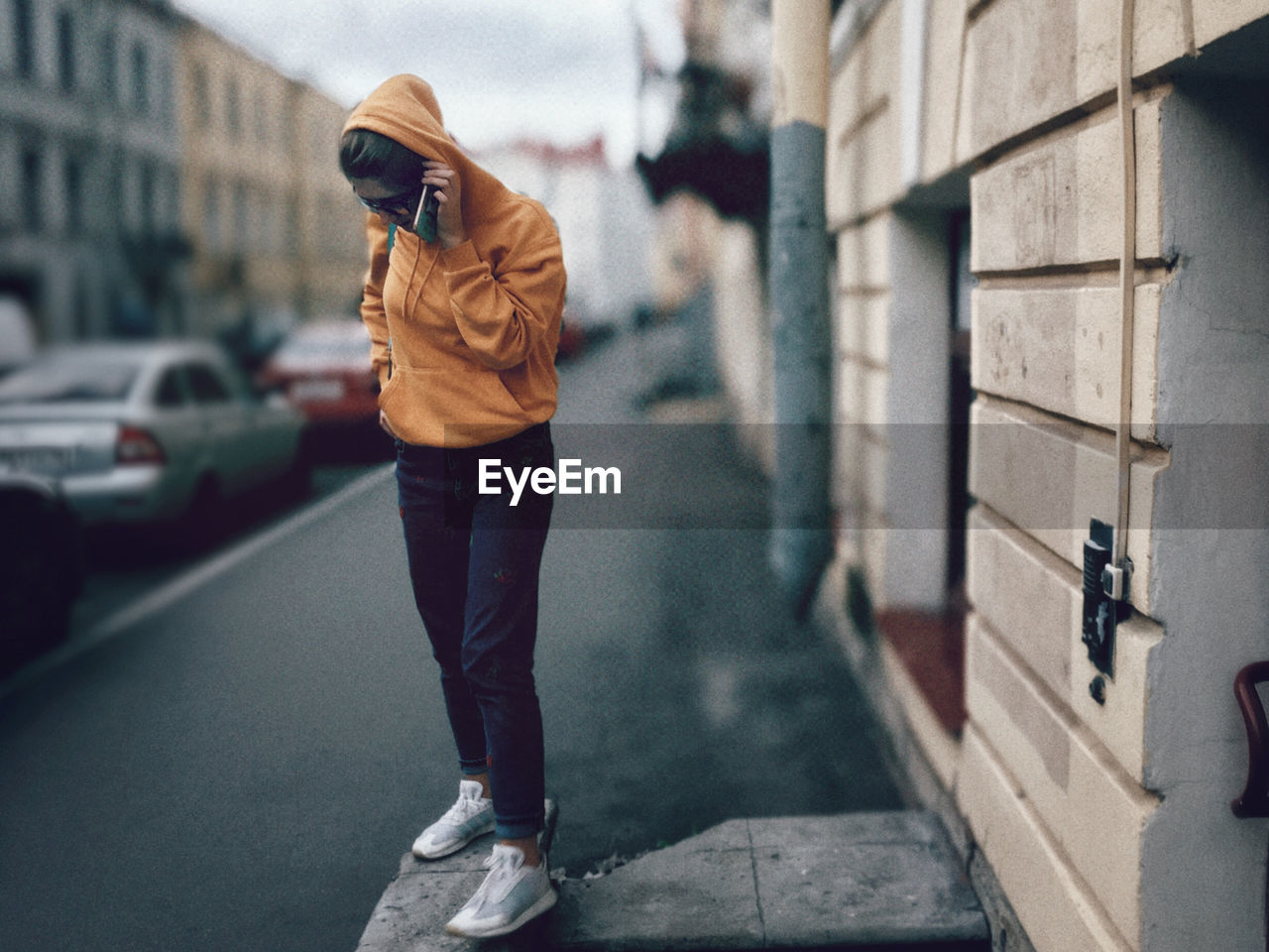 MAN WALKING ON STREET