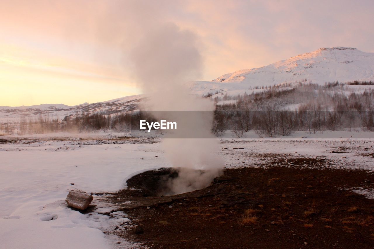 Scenic view of snow covered landscape