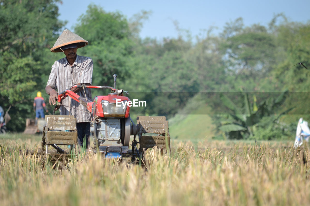 Farmer working on agricultural field