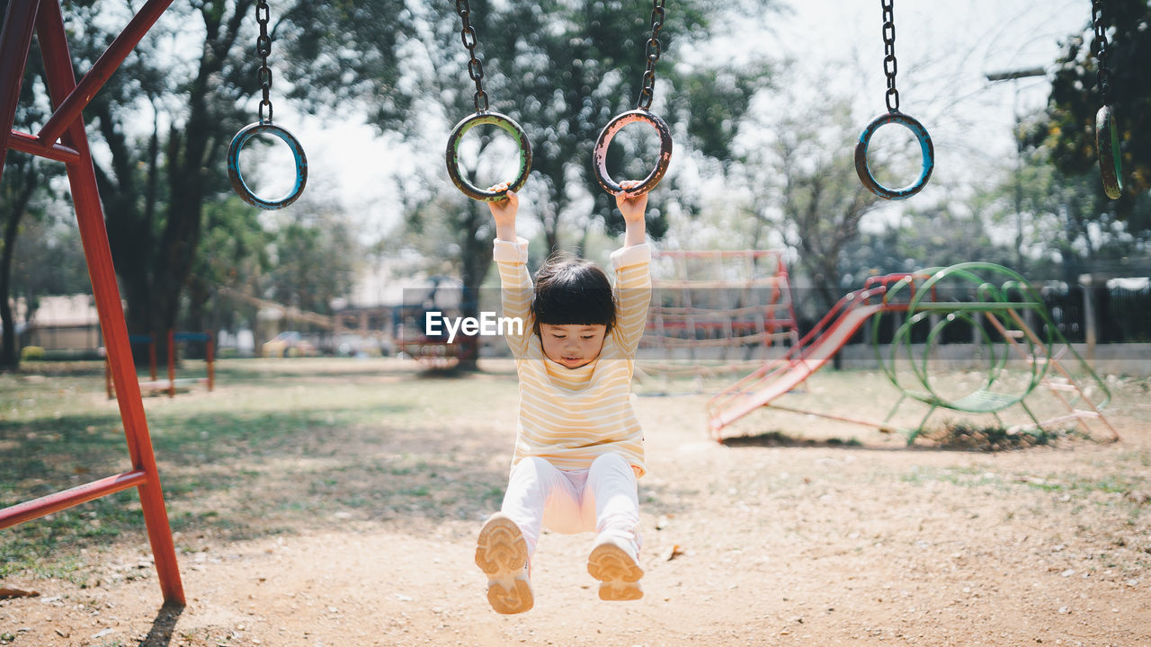 Girl playing in playground