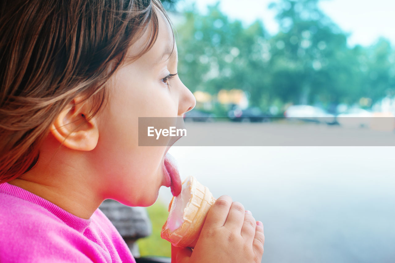 Close-up of girl eating ice cream
