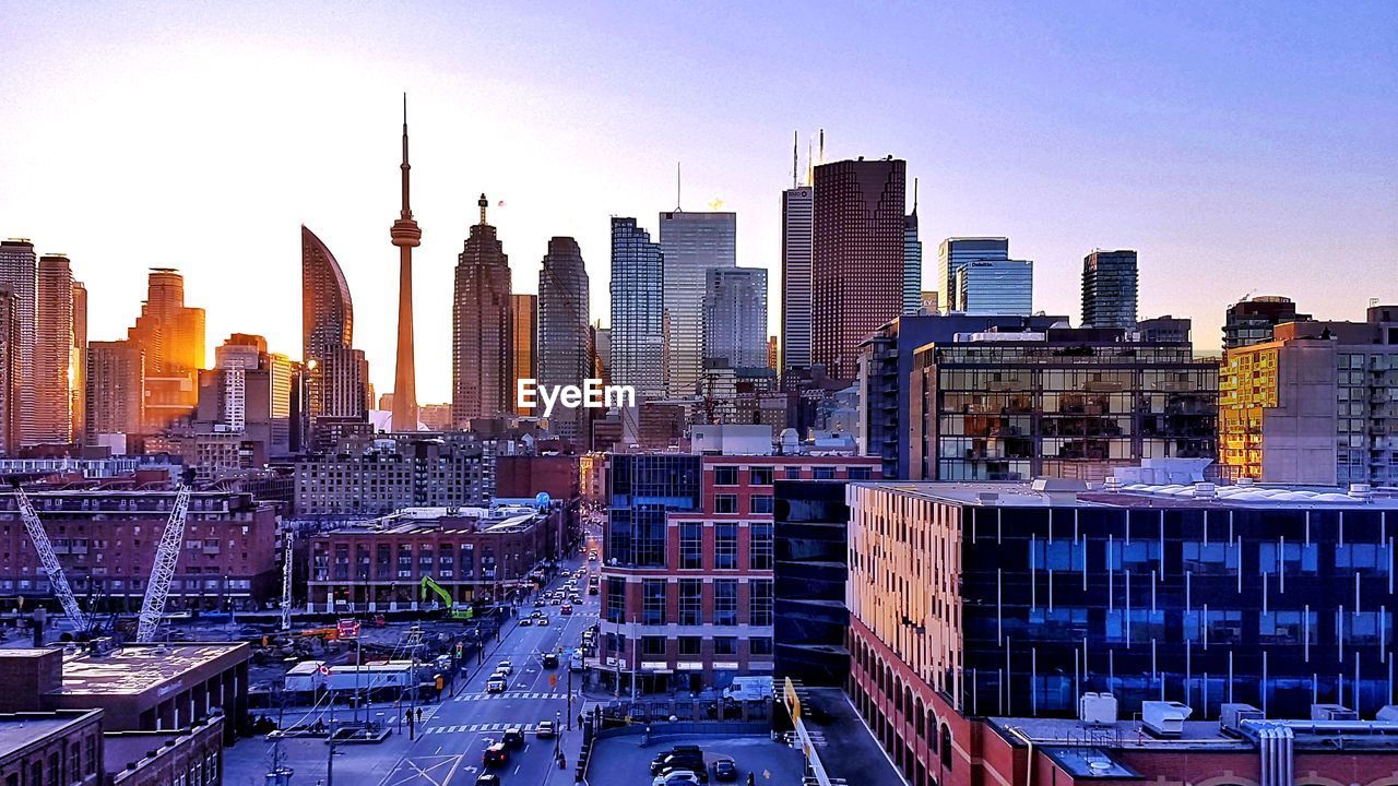 BUILDINGS IN CITY AGAINST SKY