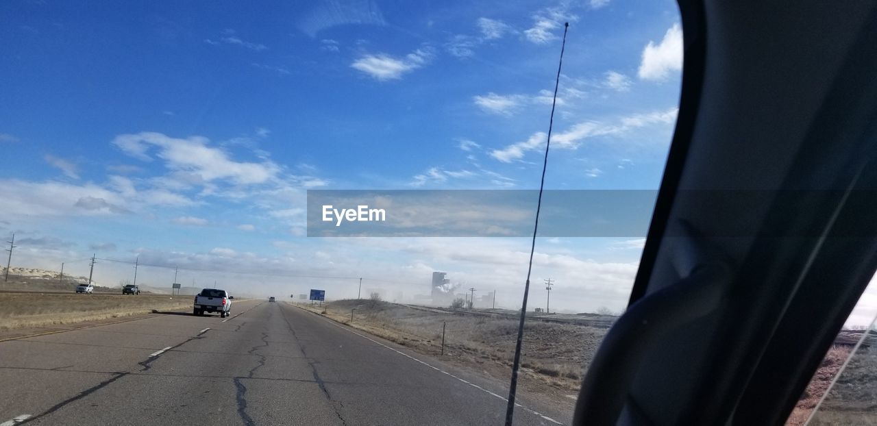 VIEW OF ROAD AGAINST SKY