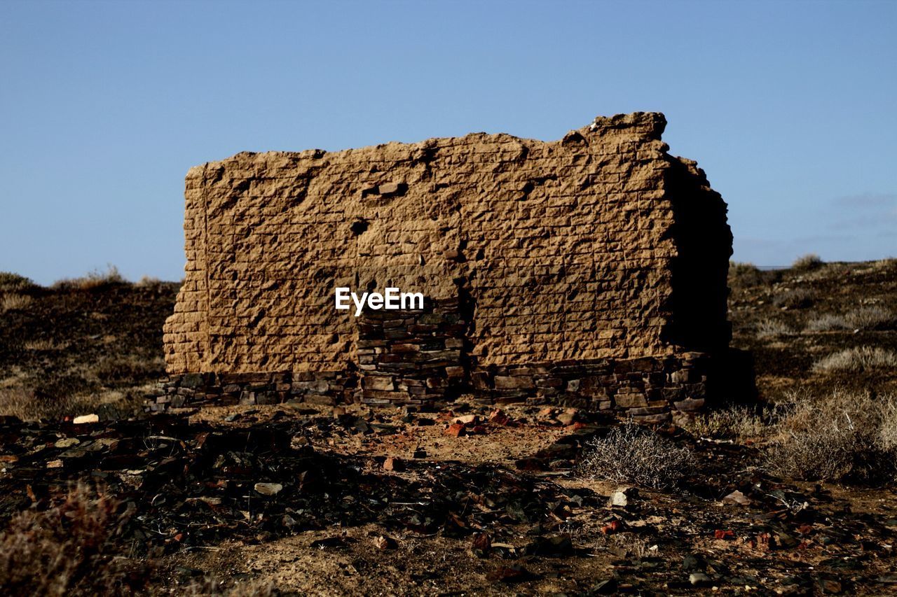 OLD RUINS AGAINST SKY