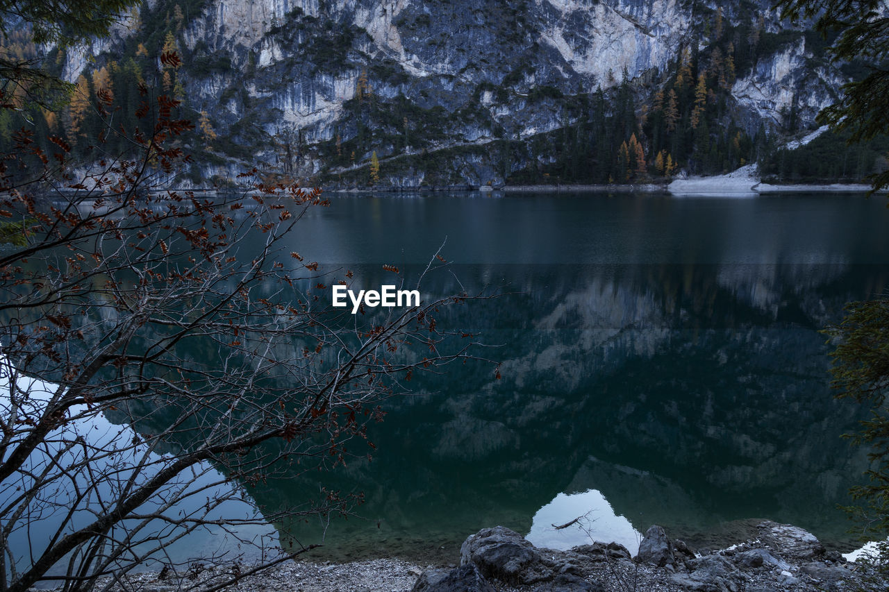 Scenic view of lake in forest during winter at lago di braies 