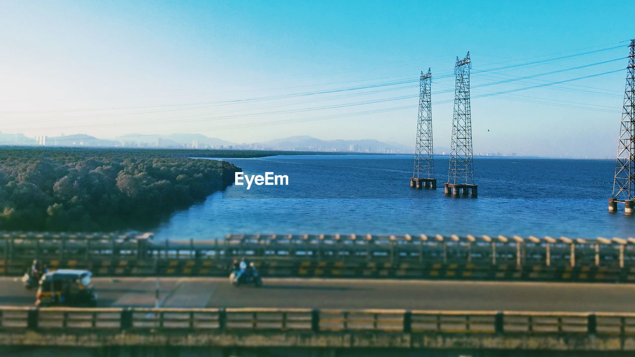 SCENIC VIEW OF SEA AGAINST SKY SEEN FROM BRIDGE