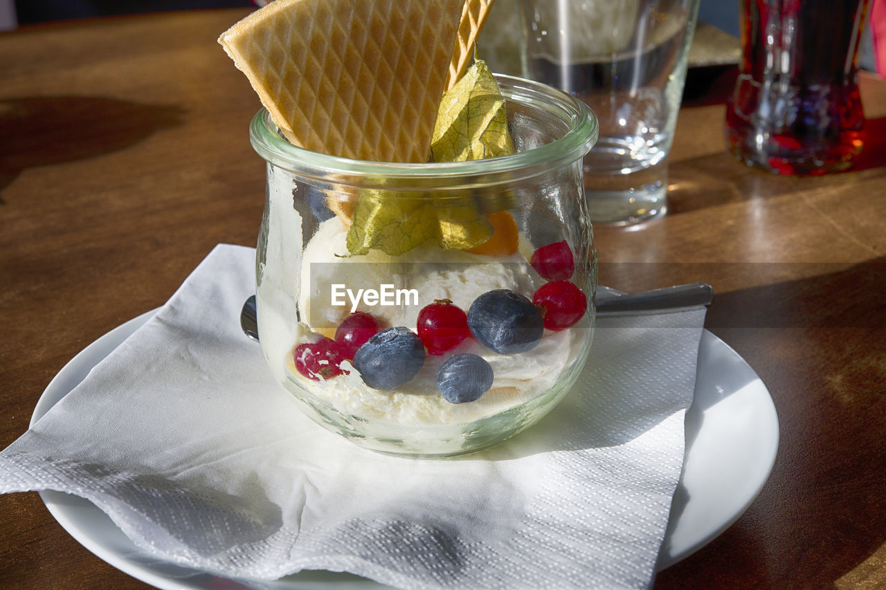 Close-up of dessert in glass on table