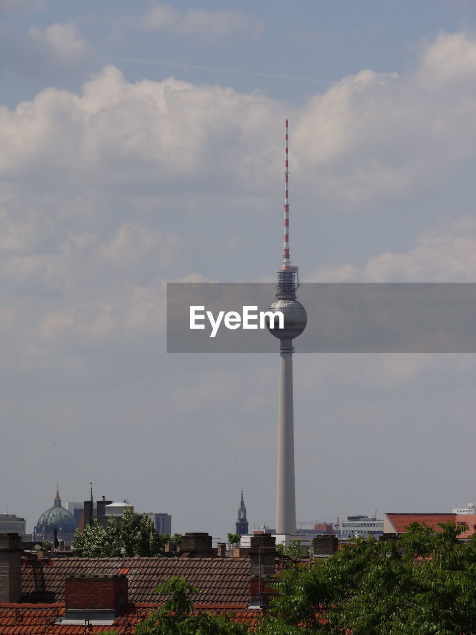 TOWER AND BUILDINGS AGAINST SKY