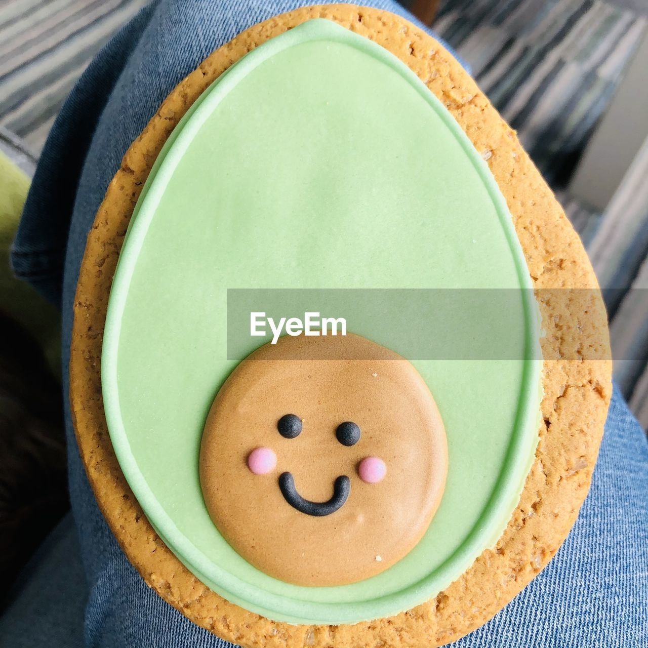food and drink, food, smiling, anthropomorphic smiley face, anthropomorphic, dessert, anthropomorphic face, indoors, face, close-up, happiness, freshness, healthy eating, fun, green, sweet food, emotion, no people, icing, representation, baked, creativity