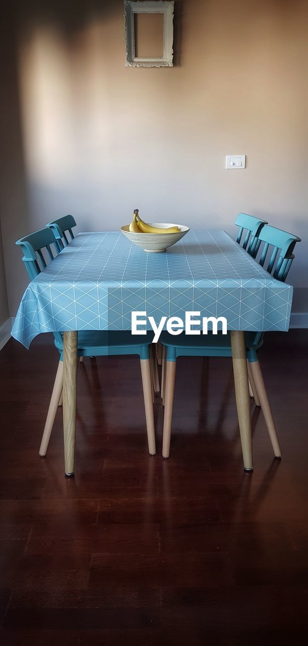 Empty chairs and tables at home