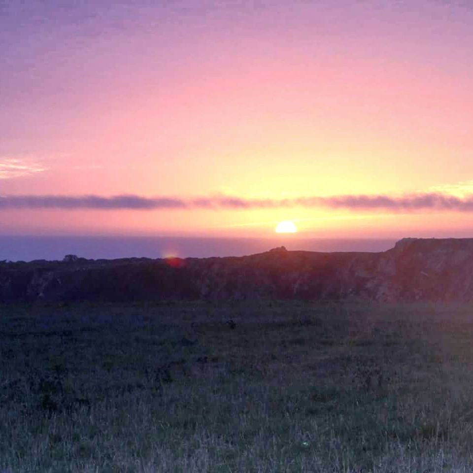 SCENIC VIEW OF LANDSCAPE AGAINST SKY AT SUNSET