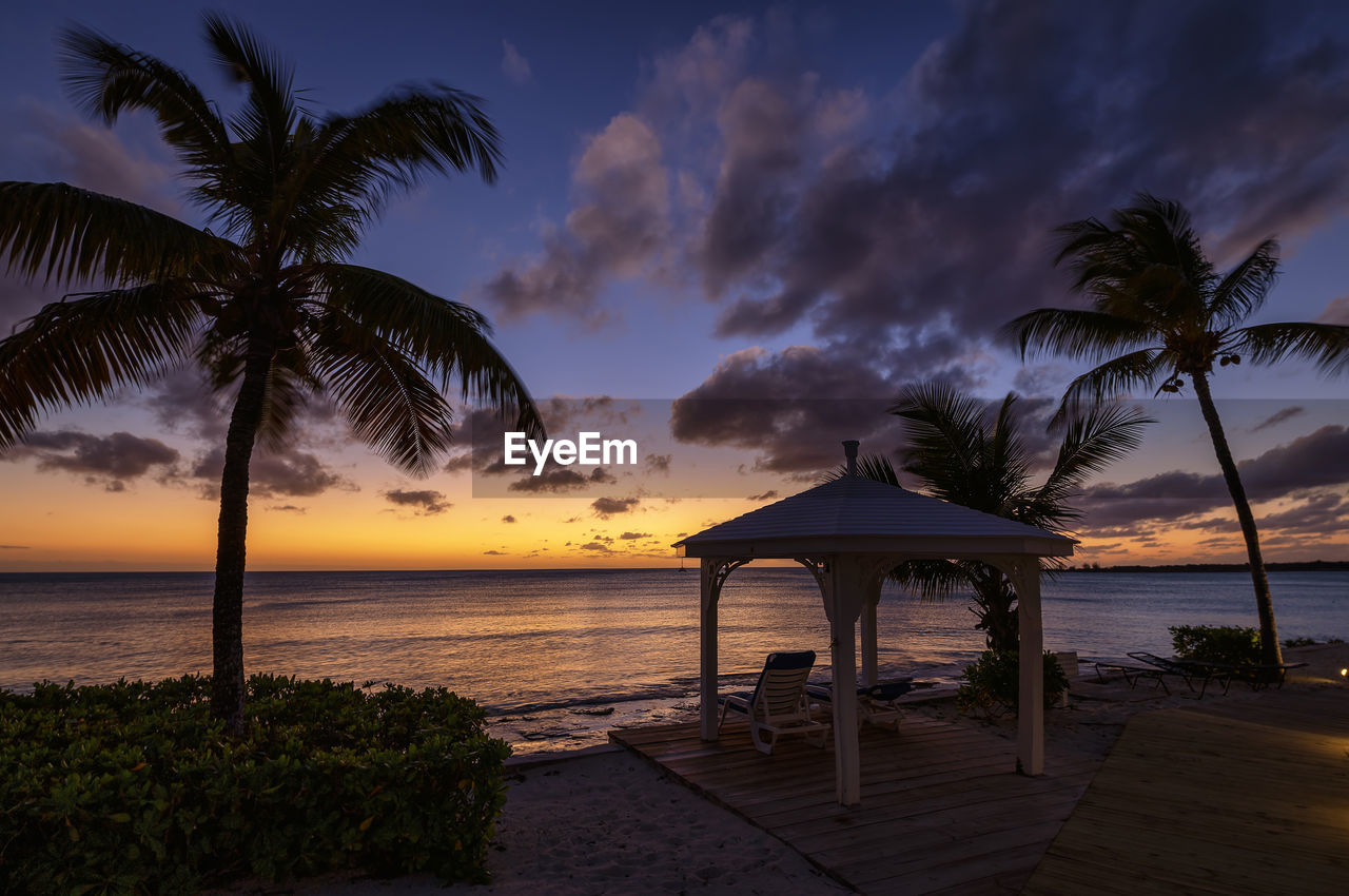 scenic view of sea against sky at sunset