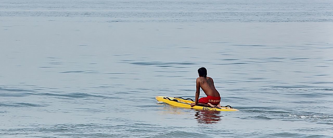 YOUNG WOMAN IN LAKE