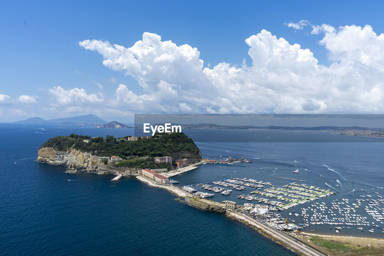 HIGH ANGLE VIEW OF BAY AGAINST SKY