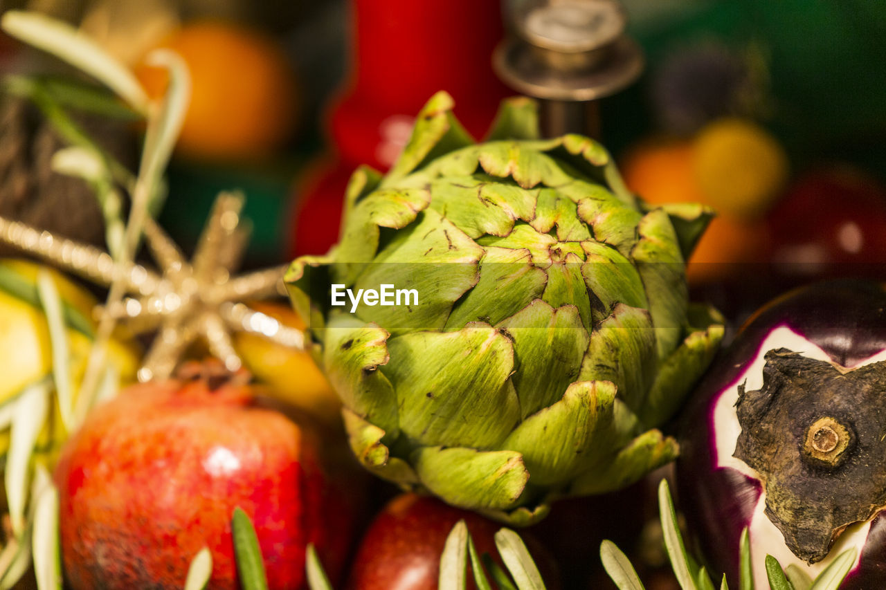 CLOSE-UP OF FRUITS FOR SALE AT MARKET STALL