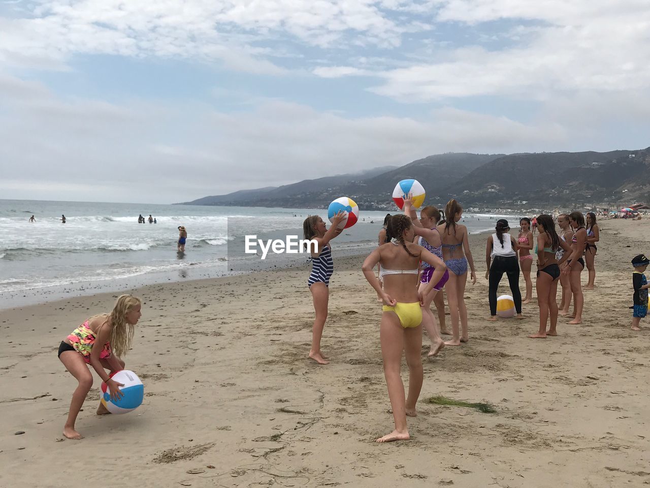 PEOPLE ENJOYING ON BEACH