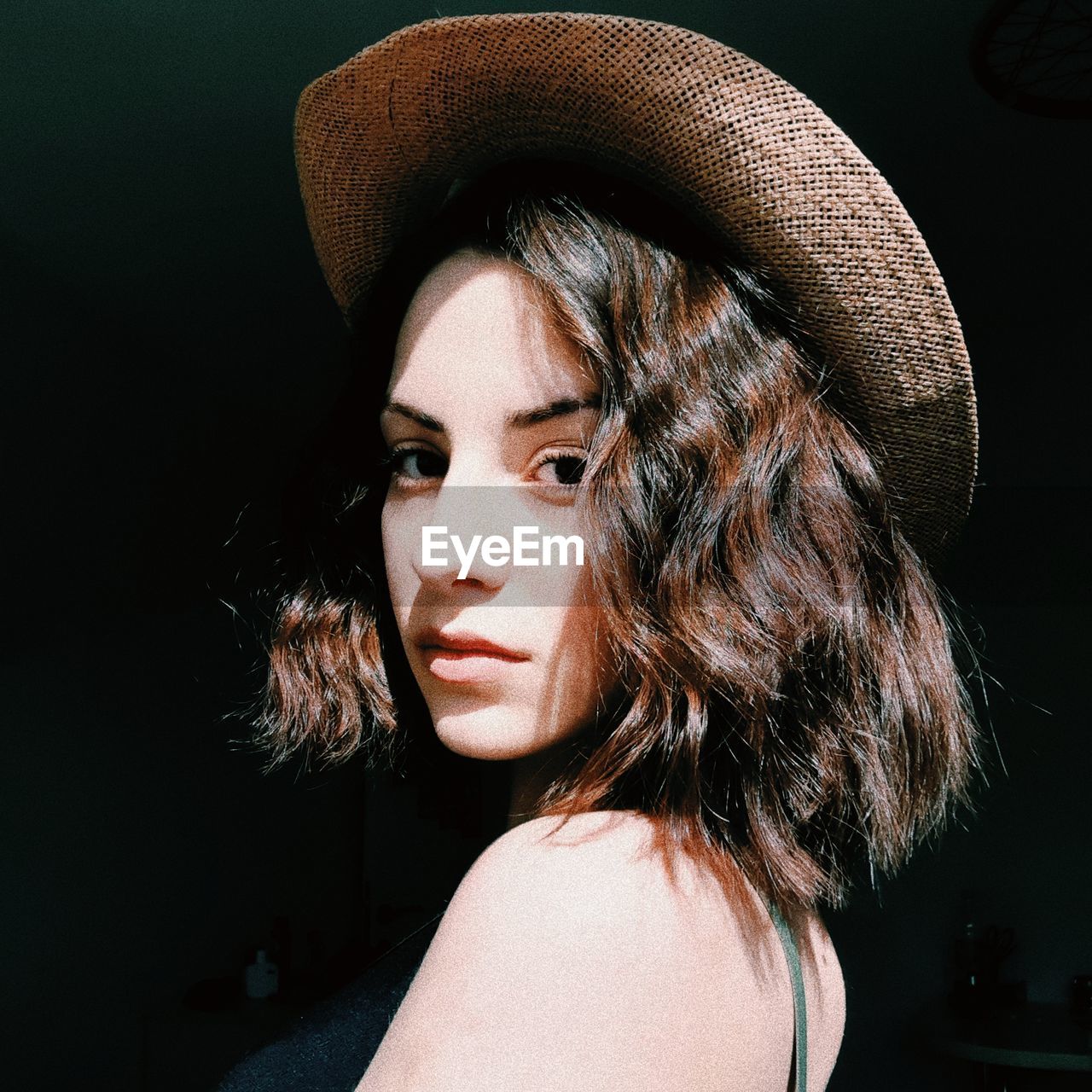 Portrait of woman wearing hat
