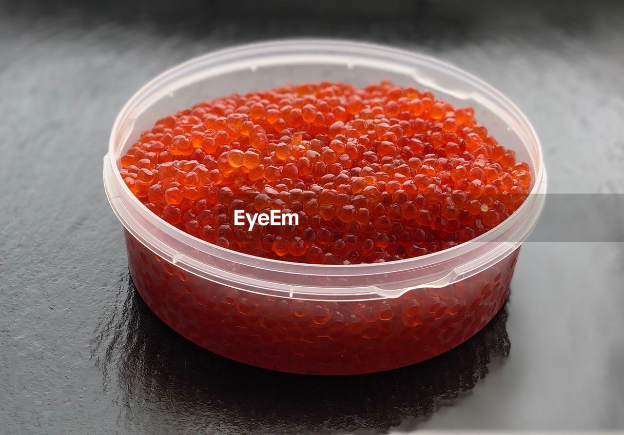 High angle view of caviar in container on table