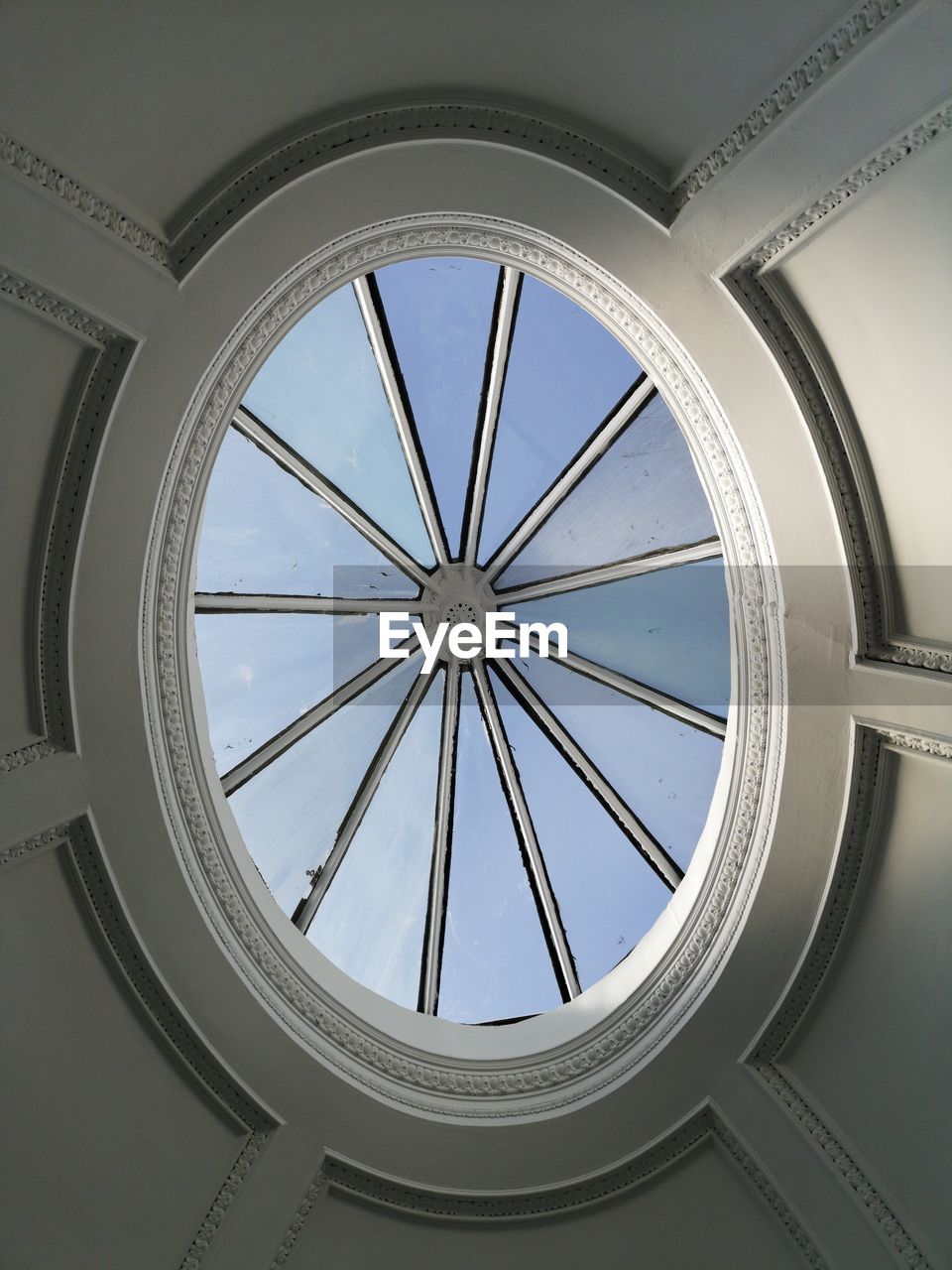 Low angle view of skylight in building