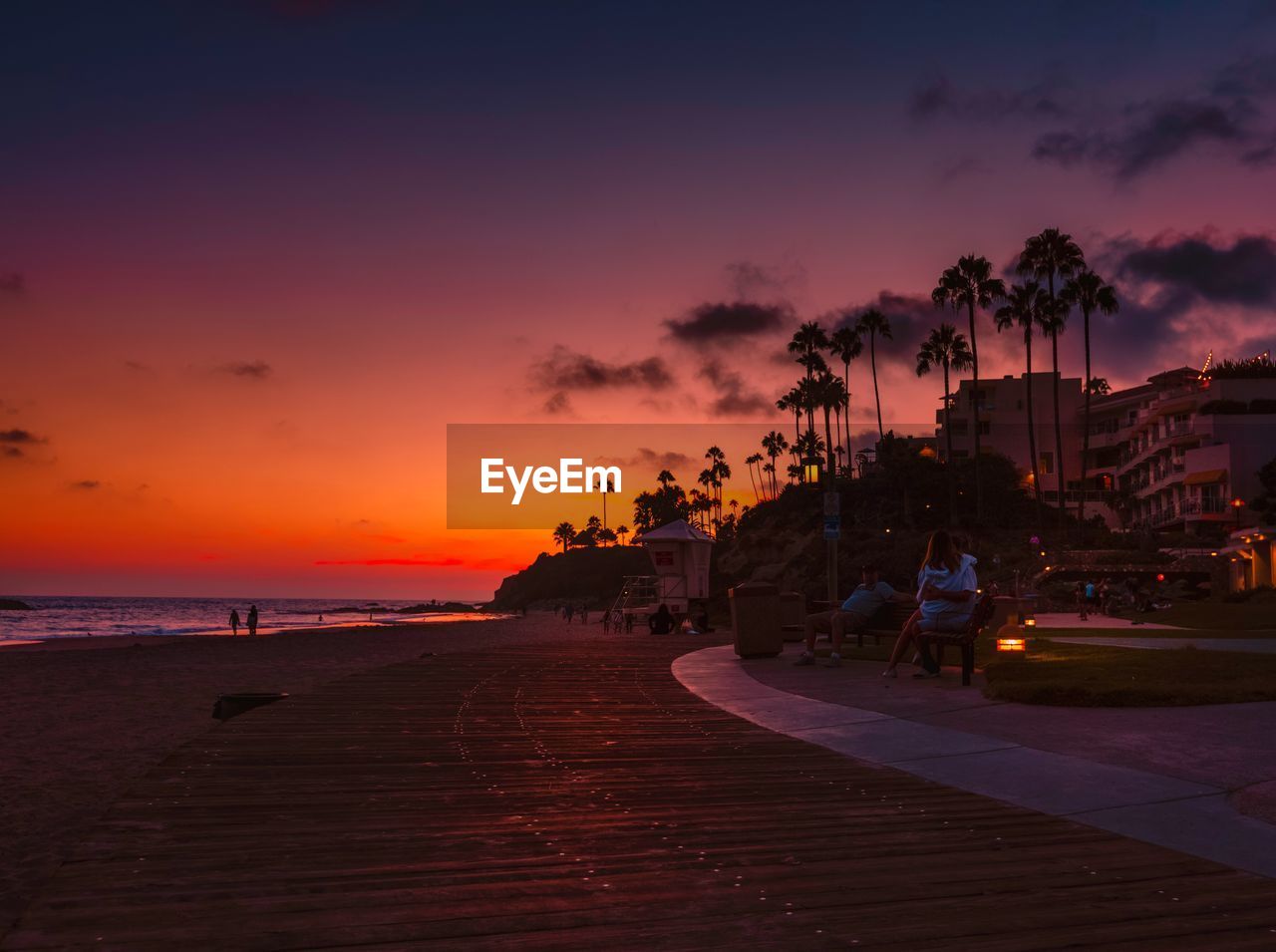 Scenic view of beach against sky during sunset