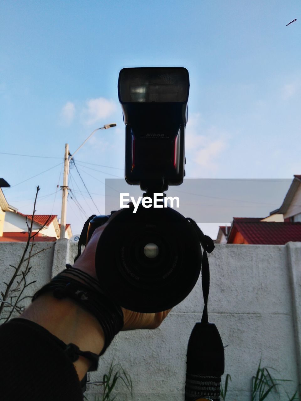 LOW ANGLE VIEW OF LAMP POST AGAINST SKY