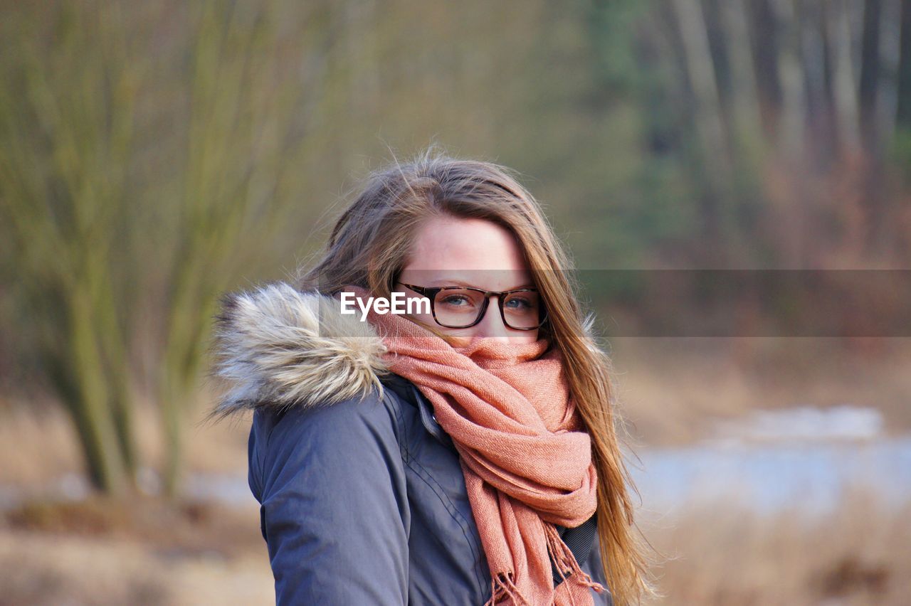 Portrait of young woman in winter