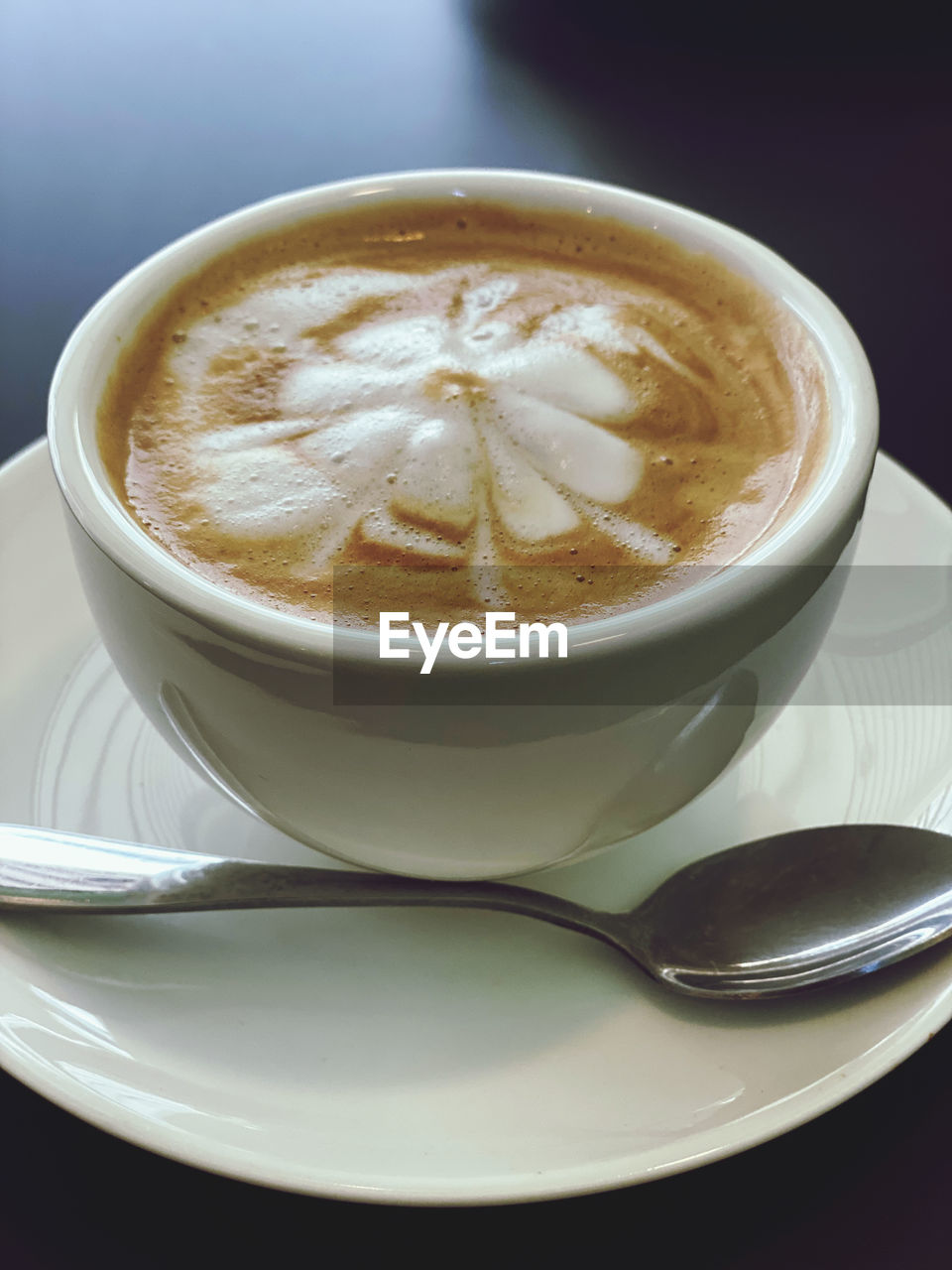food and drink, coffee, mug, cup, drink, coffee cup, refreshment, saucer, café au lait, crockery, hot drink, cappuccino, latte, spoon, eating utensil, kitchen utensil, frothy drink, flat white, food, coffee milk, dish, still life, no people, indoors, cortado, cafe, heat, close-up, studio shot