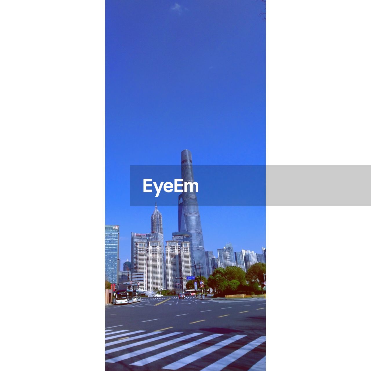 BUILDINGS AGAINST BLUE SKY