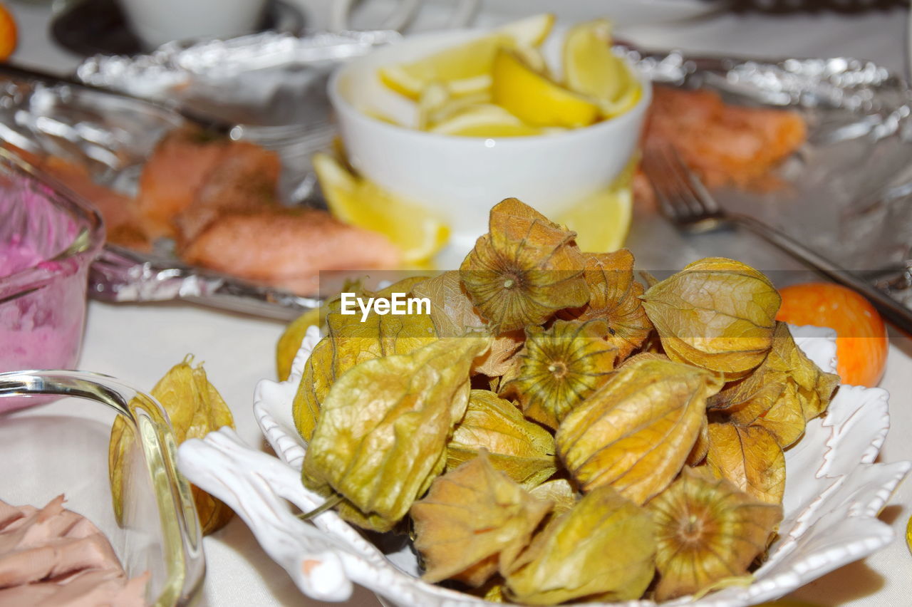 Close-up of fruits in plate on table