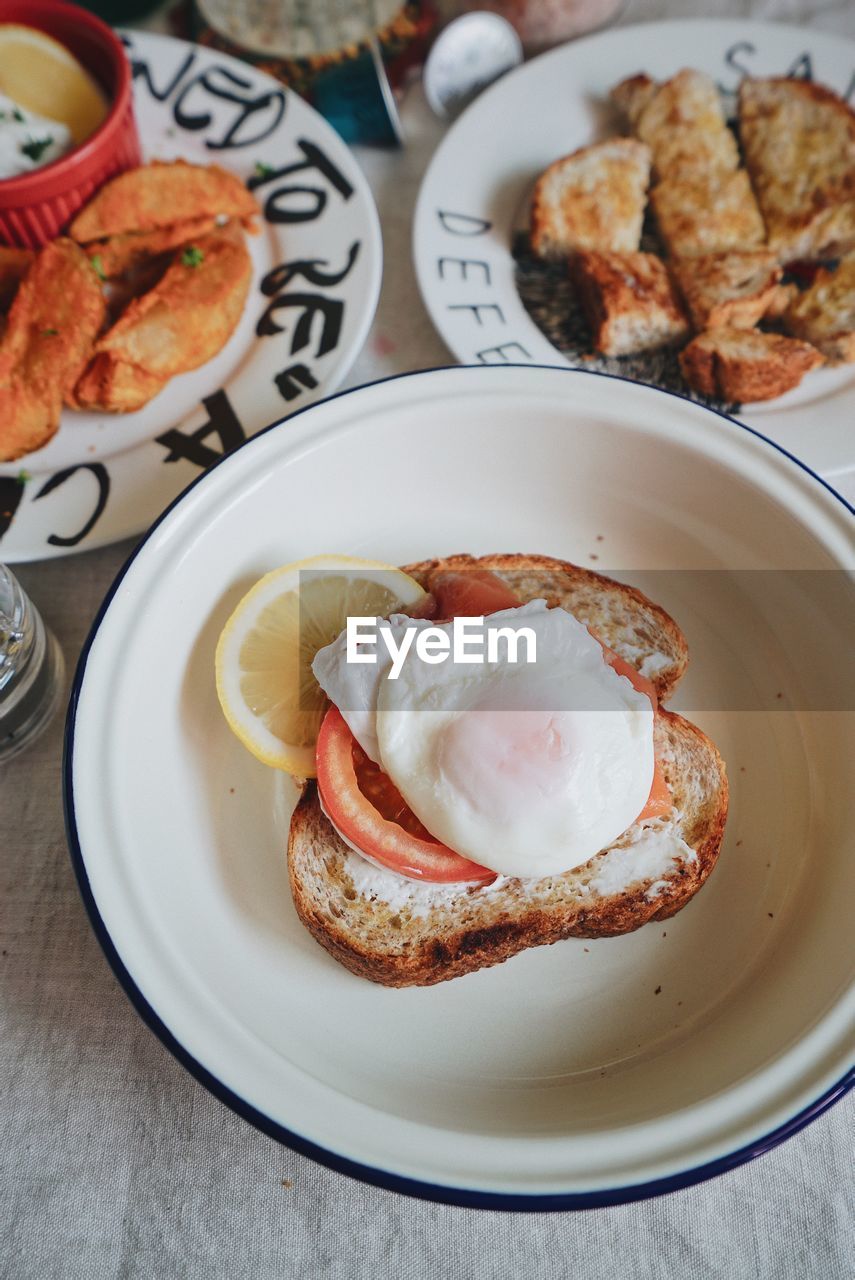 HIGH ANGLE VIEW OF BREAKFAST ON TABLE