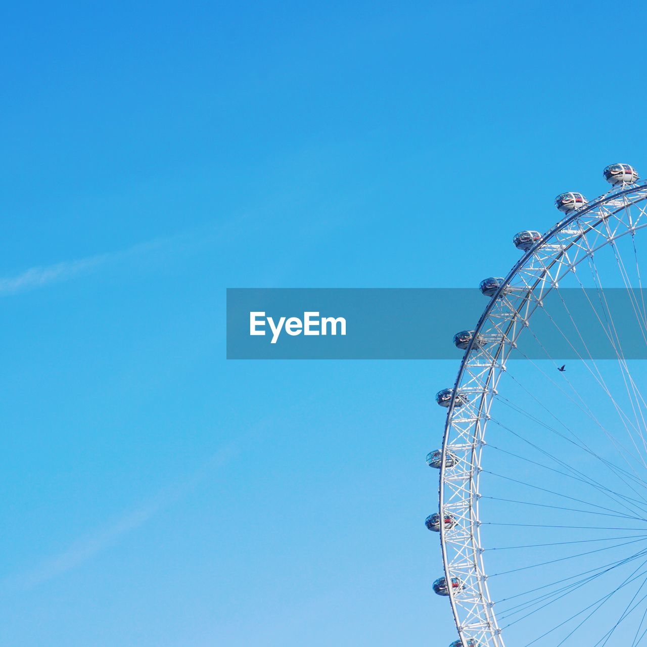 Low angle view of ferris wheel against sky