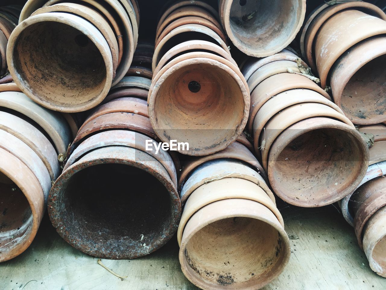 High angle view of earthenware arranged in workshop