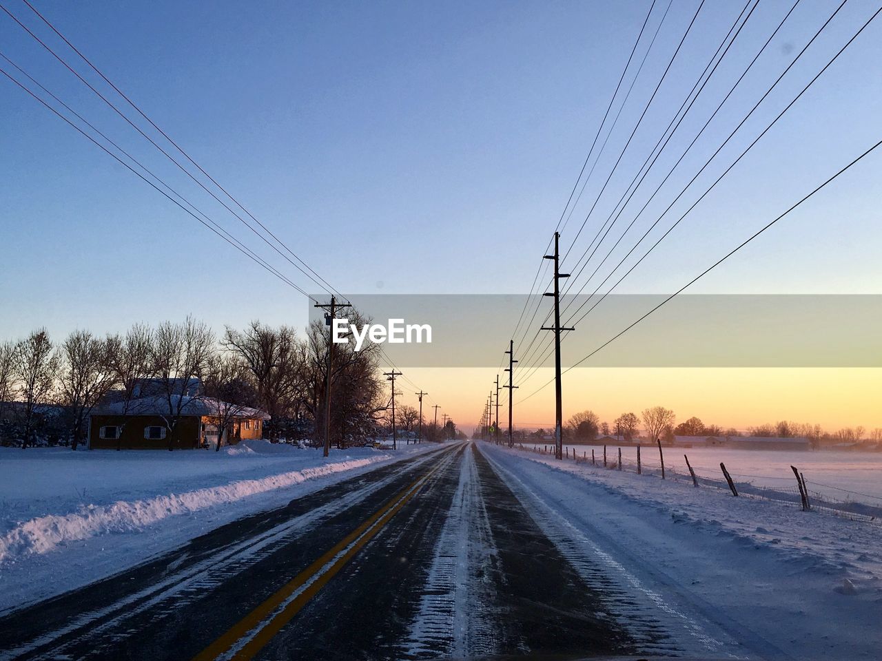 Road against sky during winter