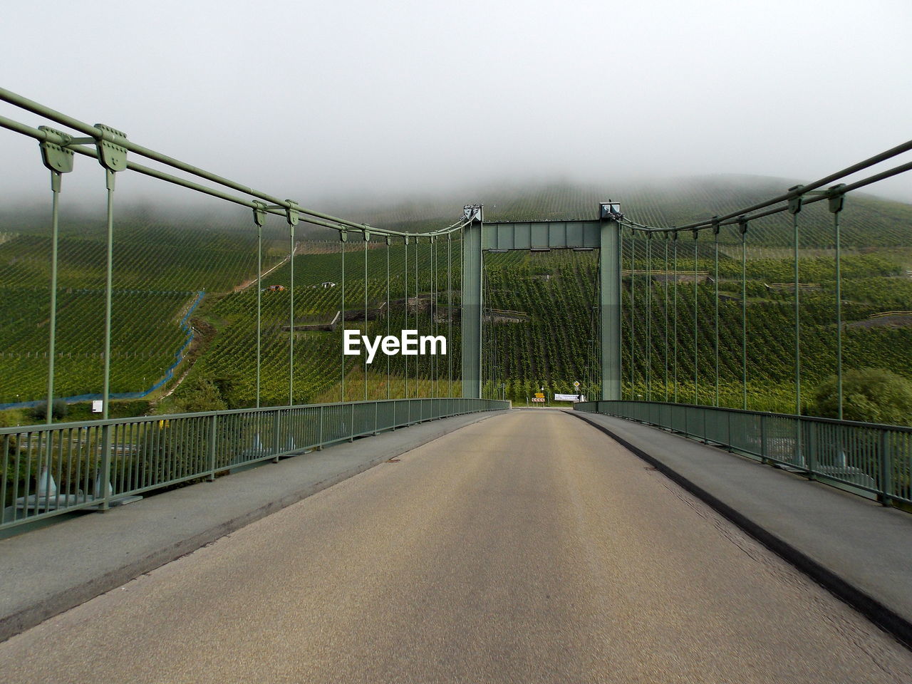 Suspension bridge during foggy weather