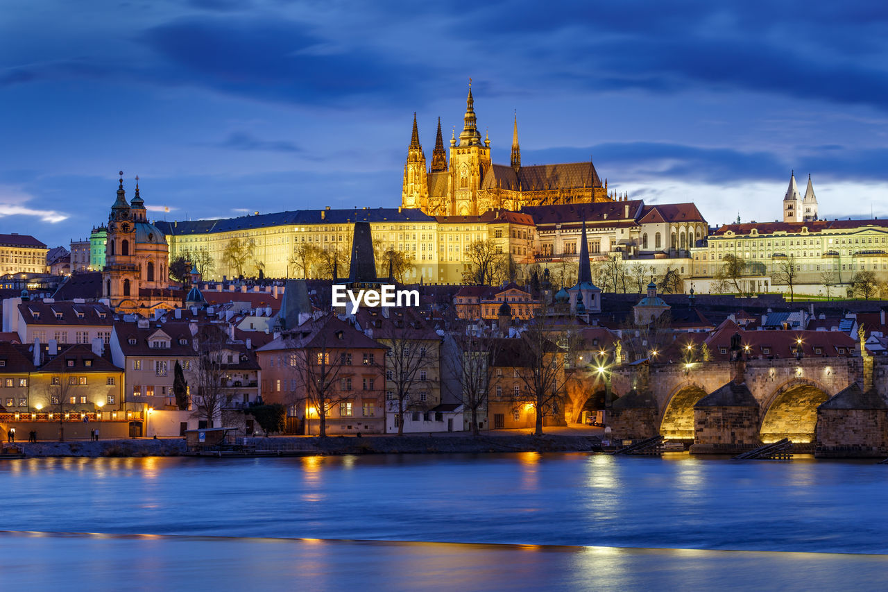 Evening view of prague castle over river vltava.