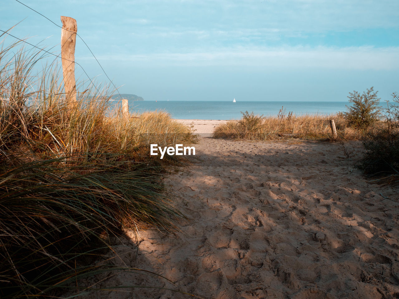 Scenic view of beach against sky