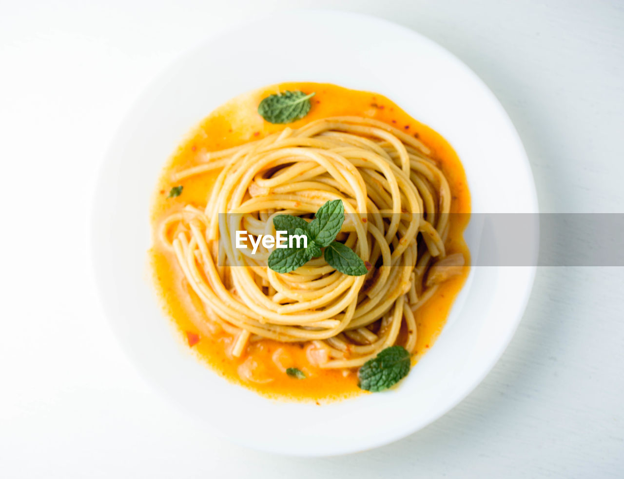 Spaghetti pasta white background overhead shot