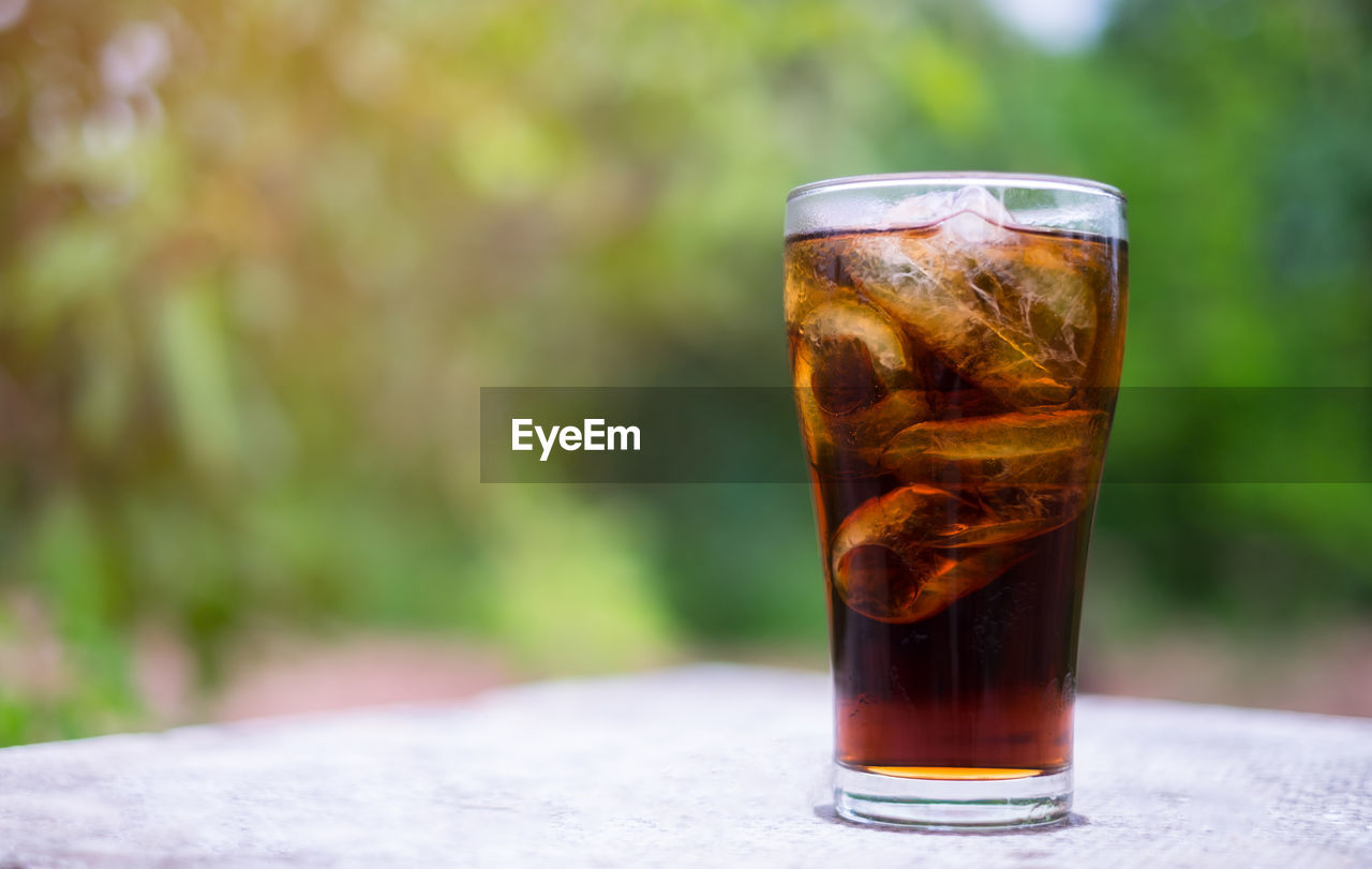 Close-up of iced tea on table