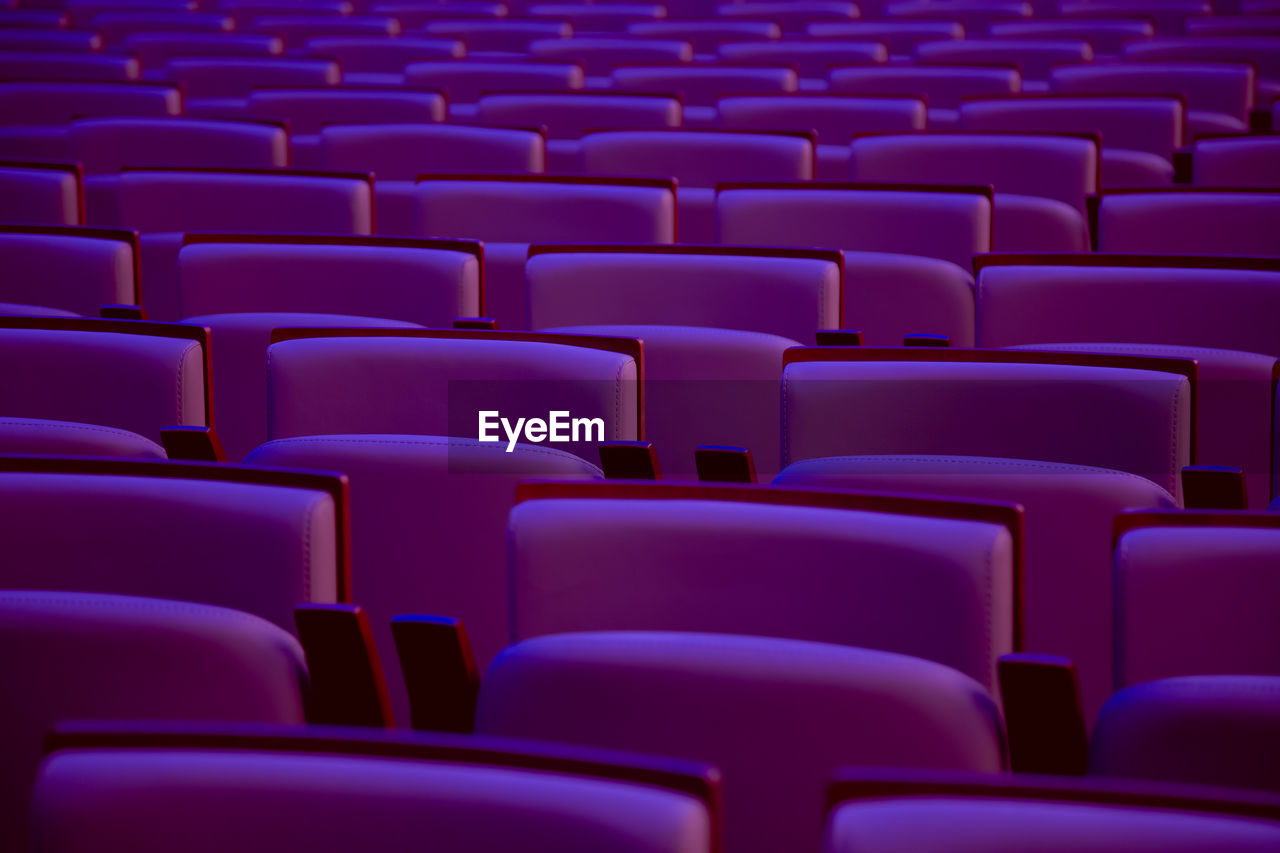 Full frame shot of empty chairs at movie theater