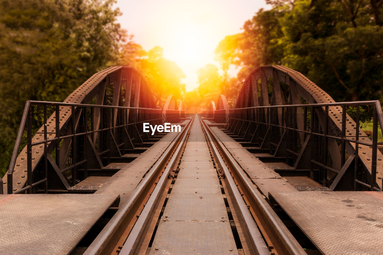 View of footbridge at sunset