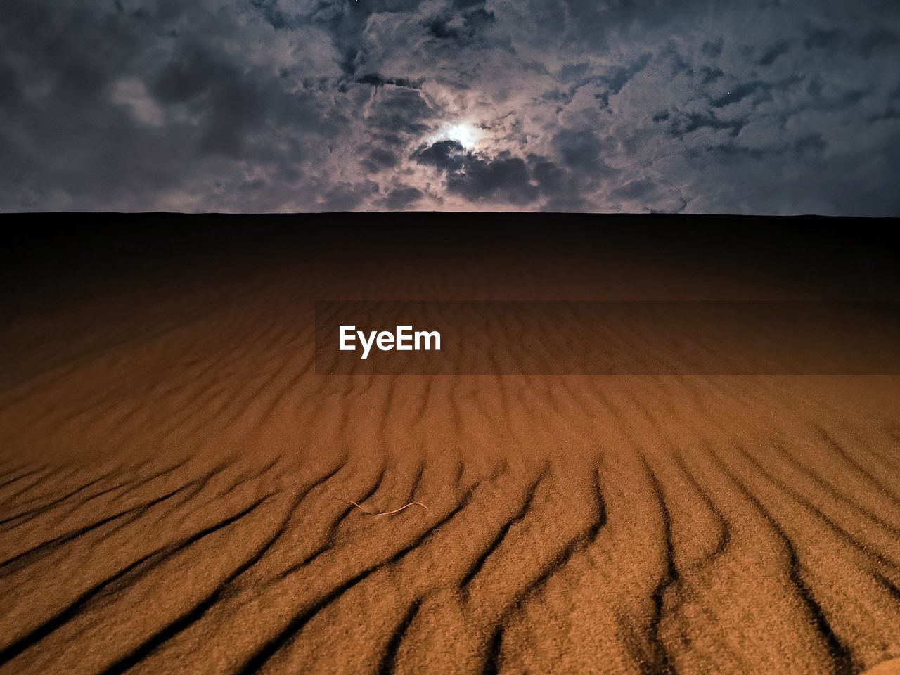 Scenic view of desert against sky