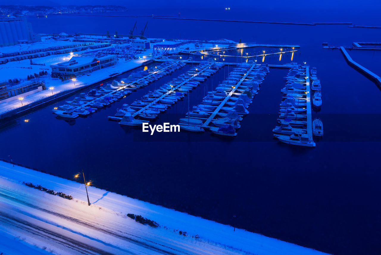 High angle view of illuminated city at night