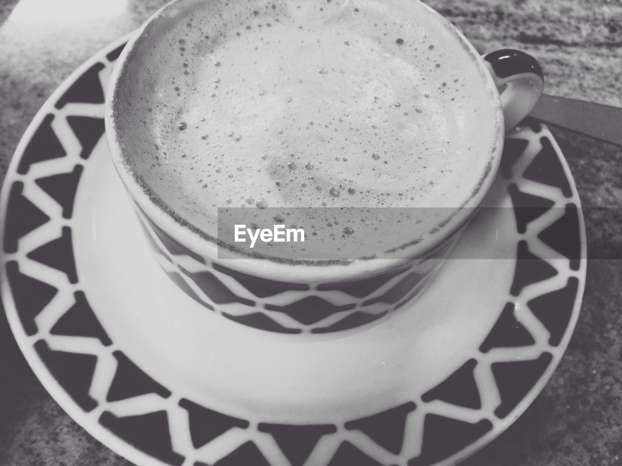 Close-up of coffee served on table